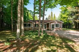 Hilltop Home with Torch Lake Views - Image 3